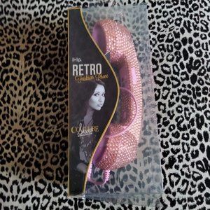 Retro pink studded cellphone handset